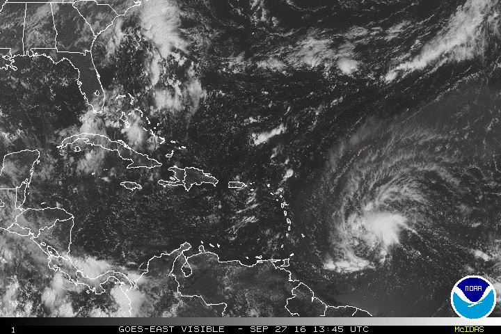 Invest 97L is rotating toward the Caribbean islands this evening. (NOAA/NHC)
